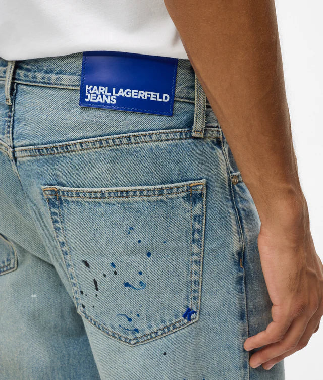 Paint splatter tapered jeans