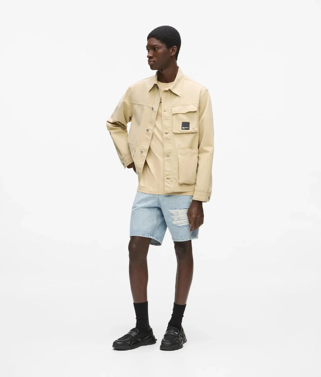 DISTRESSED RELAXED DENIM SHORTS